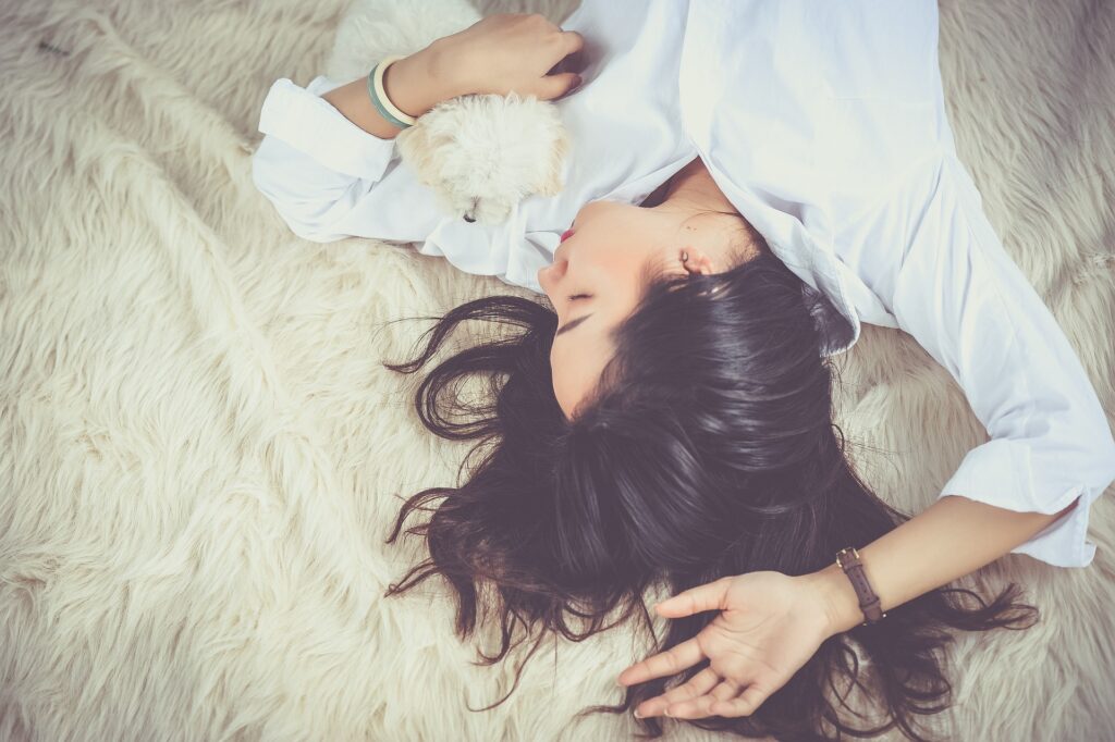 woman sleeping - Body Shaking Spiritual Meanings