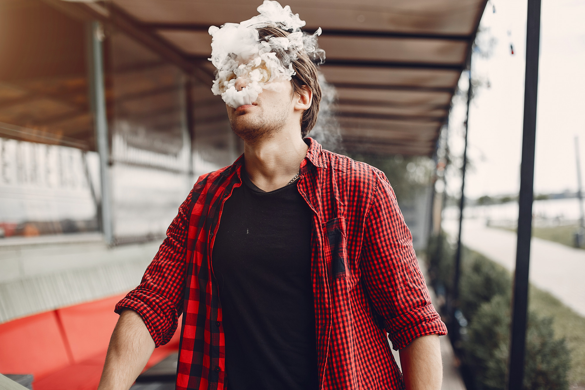 man smoking - spiritual meanings of smelling smoke